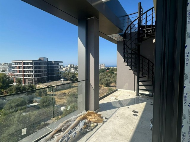 3+1 PENTHOUSE FLAT FOR SALE ON CYPRUS KYRENIA BELLAPAIS ROAD WITH PRIVATE TERRACE AND JACUZZI INFRASTRUCTURE ON THE TERRACE AND WITH STUNNING MOUNTAIN AND SEA VIEWS