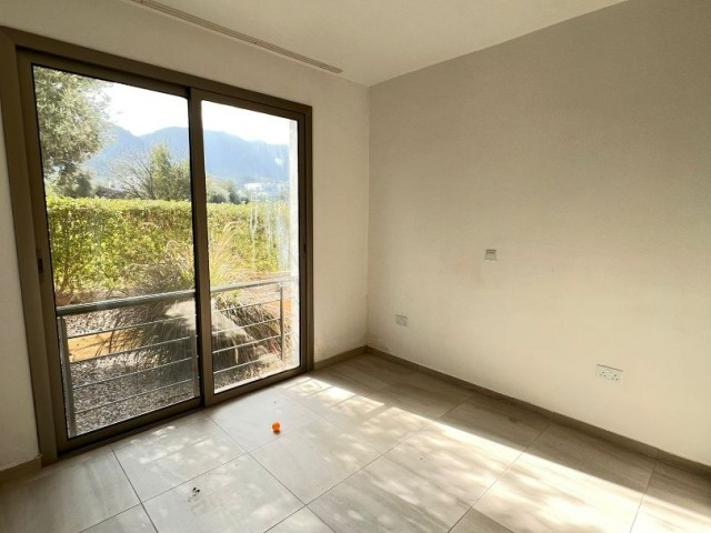 2+1 FLAT FOR SALE WITH LARGE GARDEN AND BALCONY IN A SITE WITH COMMON POOL IN CYPRUS GIRNE ZEYTİNLİK
