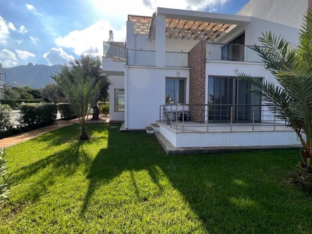 2+1 VILLA-LIKE FLATS FOR SALE WITH PRIVATE GARDEN AND ENTIRE BATHROOM IN A SITE WITH POOL IN CYPRUS GIRNE ZEYTİNLİK AREA