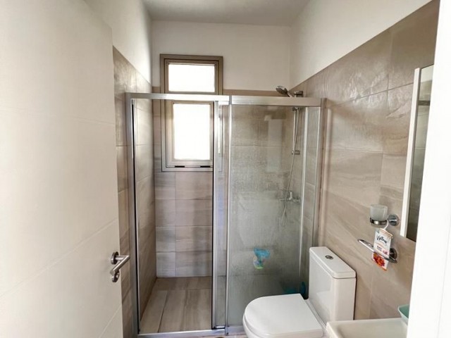 2+1 VILLA-LIKE FLATS FOR SALE WITH PRIVATE GARDEN AND ENTIRE BATHROOM IN A SITE WITH POOL IN CYPRUS GIRNE ZEYTİNLİK AREA