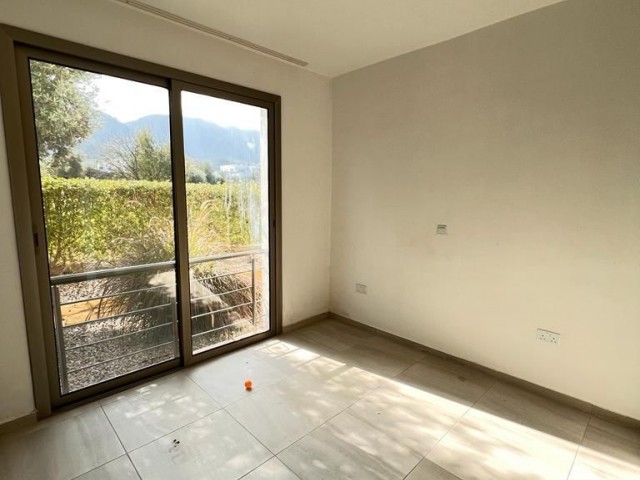 2+1 VILLA-LIKE FLATS FOR SALE WITH PRIVATE GARDEN AND ENTIRE BATHROOM IN A SITE WITH POOL IN CYPRUS GIRNE ZEYTİNLİK AREA