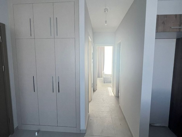 2+1 FLATS FOR SALE IN CYPRUS GIRNE ALSANCAK REGION WITH CLOSED PARKING PARKING, TERRACE, MOUNTAIN, SEA VIEW, TURN KEY AFTER 50% PAYMENT, 12 MONTHS MAINTENANCE.