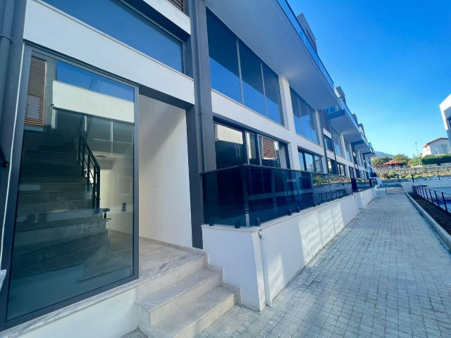 2+1 FLATS FOR SALE IN CYPRUS GIRNE ALSANCAK REGION WITH CLOSED PARKING PARKING, TERRACE, MOUNTAIN, SEA VIEW, TURN KEY AFTER 50% PAYMENT, 12 MONTHS MAINTENANCE.