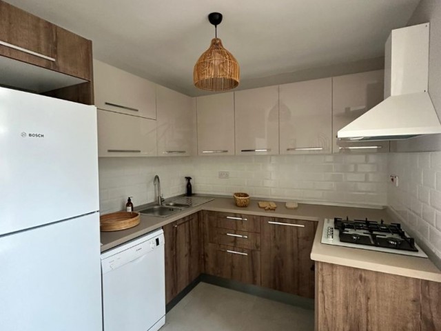 4+1 FLATS FOR SALE IN CYPRUS GIRNE ALSANCAK REGION WITH CLOSED PARKING PARKING, TERRACE, MOUNTAIN, SEA VIEW, TURN KEY AFTER 50% PAYMENT, 12 MONTHS MAINTENANCE.