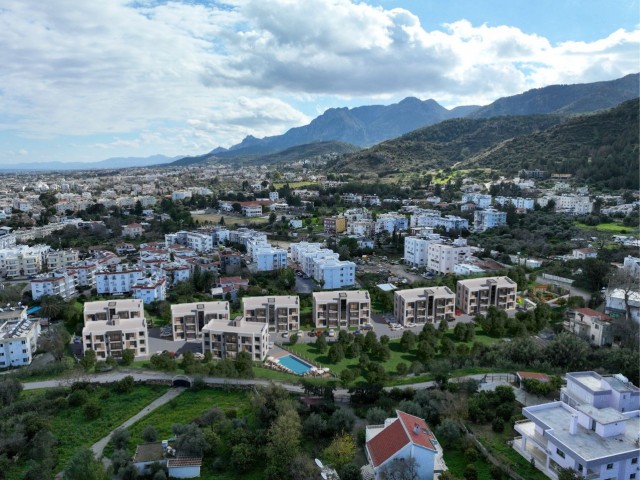 1+1 WOHNUNGEN ZUM VERKAUF AUF EINEM GRUNDSTÜCK MIT BERG- UND MEERBLICK UND POOL IN DER REGION GIRNE LAPTA ZYPERN