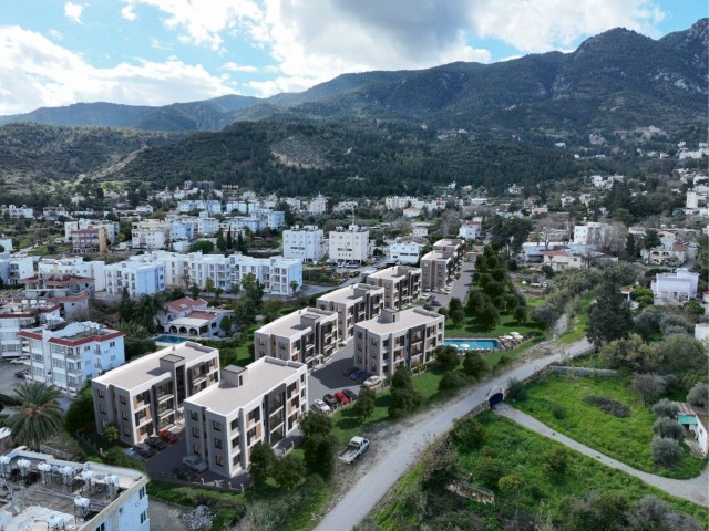 1+1 FLATS FOR SALE IN A SITE WITH MOUNTAIN AND SEA VIEWS AND POOL IN CYPRUS GIRNE LAPTA REGION