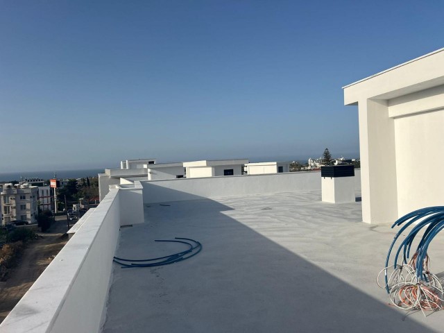 2+1 FLAT FOR SALE WITH MOUNTAIN AND SEA VIEW, WITHIN A SITE WITH POOL IN CYPRUS GIRNE ALSANCAK REGION, WITH SPECIAL PAYMENT PLAN