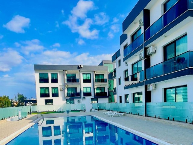 FULLY FURNISHED 2+1 FLAT FOR SALE WITH VAT AND TRANSFORMER PAID IN A SITE WITH POOL IN CYPRUS GIRNE CENTER