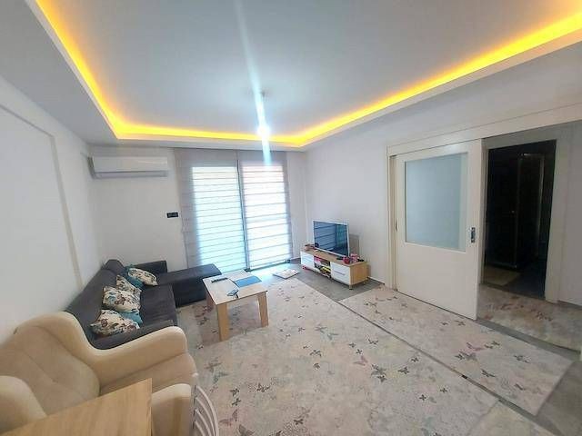 FULLY FURNISHED, ALL EXPENSES PAID, 2+1 FLAT FOR SALE IN GIRNE CENTER, CYPRUS