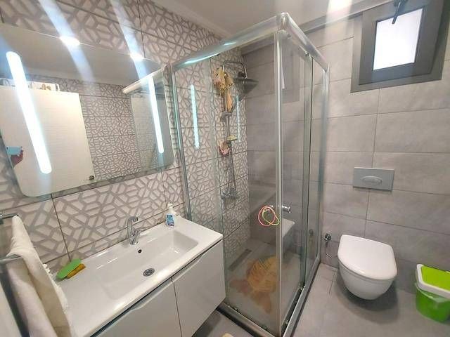 FULLY FURNISHED, ALL EXPENSES PAID, 2+1 FLAT FOR SALE IN GIRNE CENTER, CYPRUS