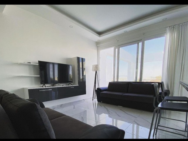 2 + 1 PENTHOUSE FULLY FURNISHED LUXURY RENTAL APARTMENT IN DEREBOYU WITH AN ANNUAL DEPOSIT OF 550 POUNDS STERLING ** 