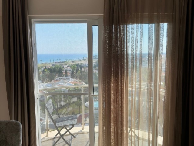 آپارتمان Iskele Long Beach Noyanlar Apartmani Sea Star 1+1 برای فروش با منظره دریا