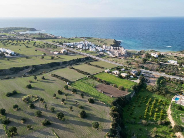 At the main road, within walking distance to the sea, for sale 22 Acres