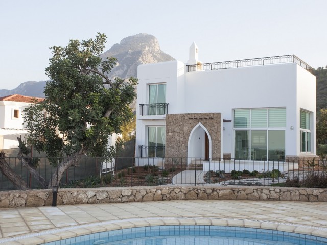 Stunning  3 bedroom villa with communal swimming pool and private garden, sea and mountain views 