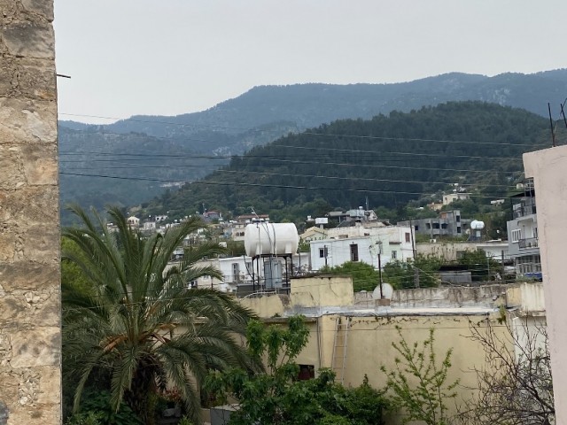 ALSANCAK YAYLA MAHALLESİNDE DAĞ VE DENİZİ GÖREN YATIRIM FIRSATI