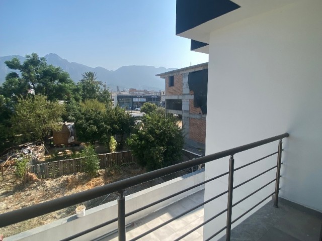 NEW BUILDING, FURNISHED  2+1 CLOSE TO MAIN ROAD 