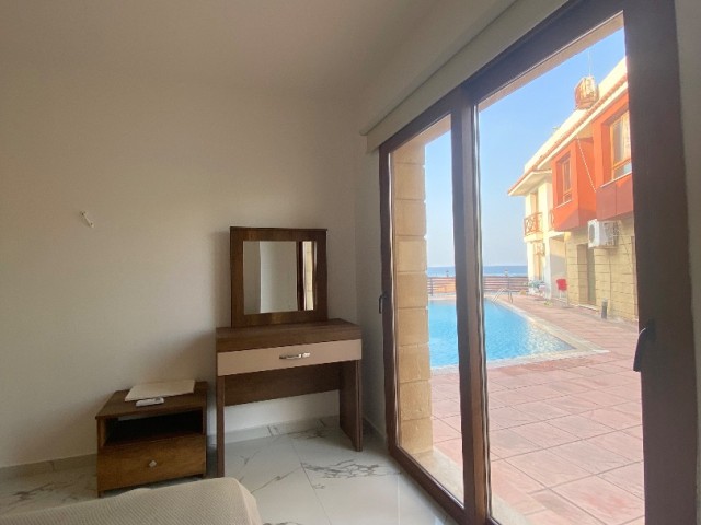 3+1 FLAT NEXT TO THE SEA WITH COMMUNAL SWIMMING POOL 