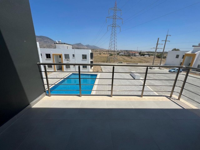 APARTMENT FOR SALE IN KYRENIA/BOGAZ WITH COMMON POOL