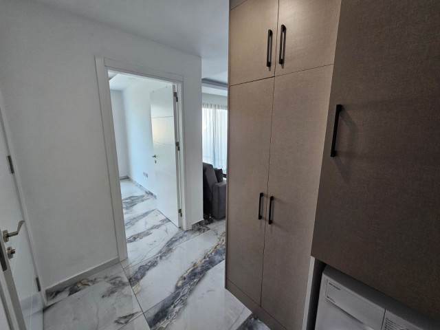 FULLY FURNISHED 1+1 FLAT FOR SALE IN A SITE WITH SHARED POOL IN GIRNE/ALSANCAK