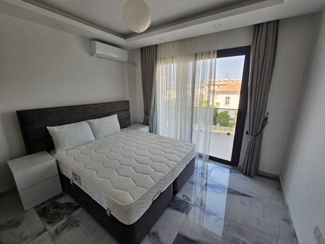 FULLY FURNISHED 1+1 FLAT FOR SALE IN A SITE WITH SHARED POOL IN GIRNE/ALSANCAK