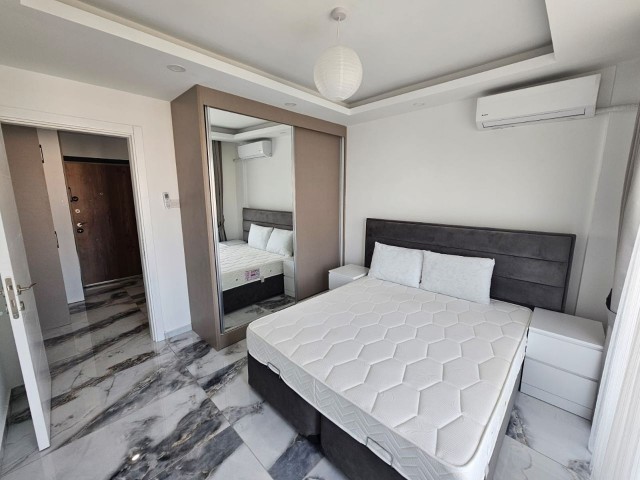 FULLY FURNISHED 1+1 FLAT FOR SALE IN A SITE WITH SHARED POOL IN GIRNE/ALSANCAK