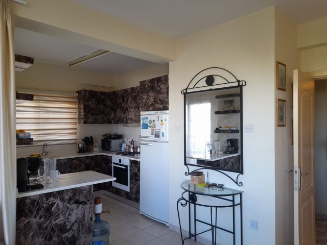 3+1 FURNISHED FLAT FOR SALE IN A SITE WITH SHARED POOL IN KYRENIA/LAPTA