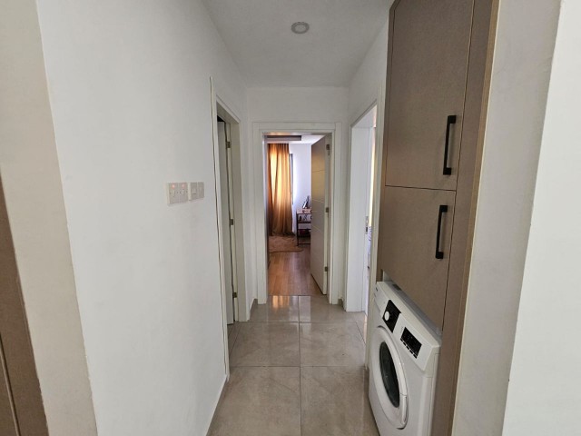 2+1 KOMPLETT MÖBLIERTE WOHNUNG ZUM VERKAUF IN GIRNE/ALSANCAK INNERHALB DES GELÄNDES