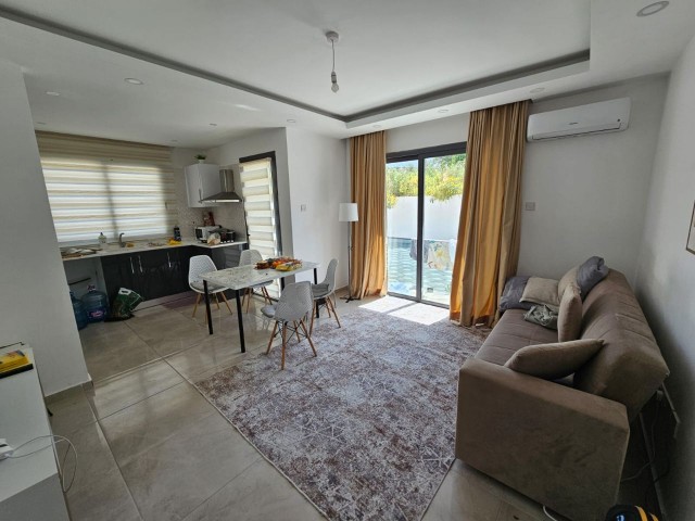 2+1 FULLY FURNISHED FLAT FOR SALE IN GIRNE/ALSANCAK WITHIN THE SITE