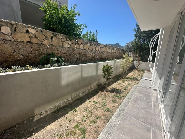 2+1 FLAT FOR SALE IN A SITE WITH SHARED POOL IN GIRNE/DOĞANKÖY