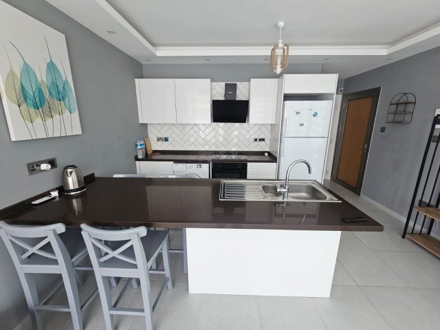 GİRNE/ALSANCAK'TA ORTAK HAVUZLU SİTE İÇERİSİNDE SATILIK 1+1 EŞYALI PENTHOUSE