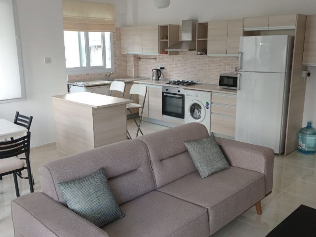 1+1 FLAT FOR SALE IN A SITE WITH COMMON POOL IN GIRNE/ALSANCAK