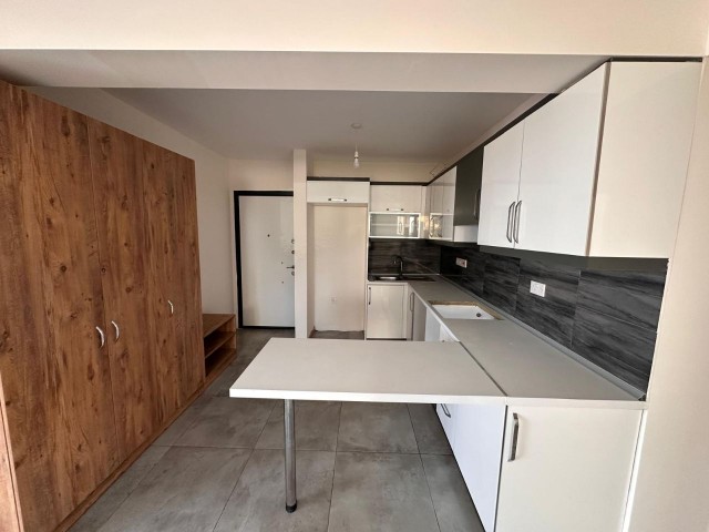 2+1 FLAT FOR SALE IN A SITE WITH POOL IN GIRNE/ALSANCAK