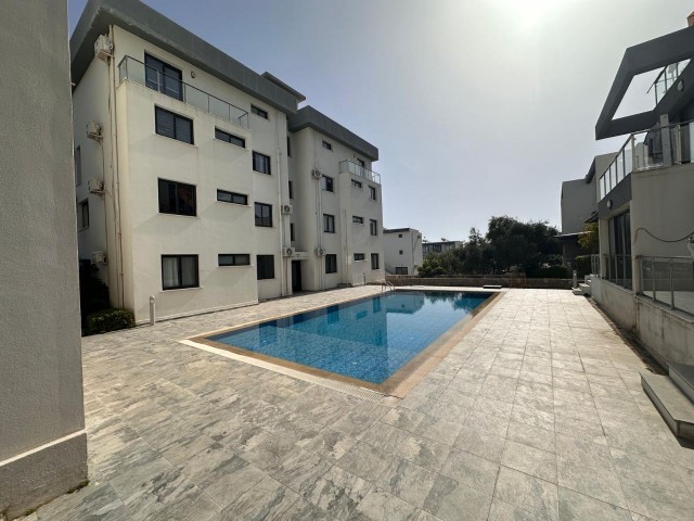 2+1 FLAT FOR SALE IN A SITE WITH POOL IN GIRNE/ALSANCAK