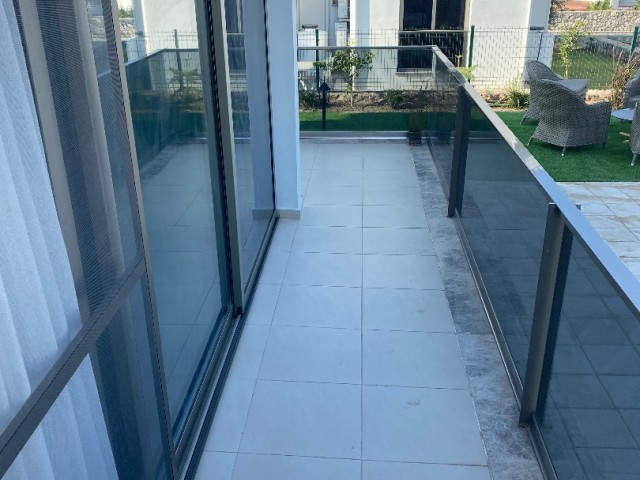 BY THE OWNER, 2+1 SPACIOUS GARDEN FLOOR FOR SALE IN ÇATALKÖY, WITH RENTAL OF 700 GBP ** 