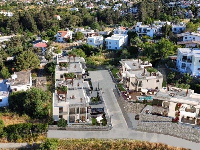 Wohnungen zum Verkauf in Kyrenia/Çatalkoy mit privatem Garten oder Terrasse