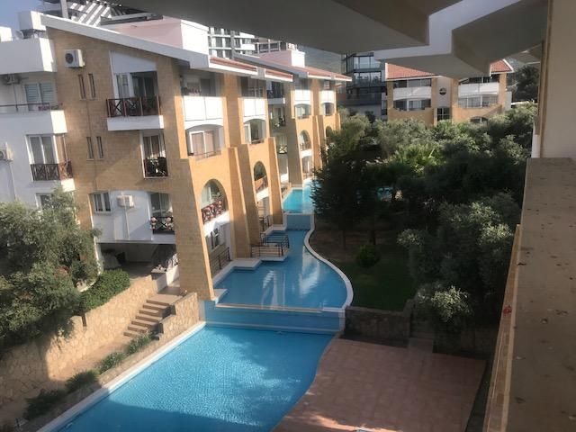 TURKISH KOÇAN FLAT FOR SALE IN KYRENIA CENTER WITH POOL