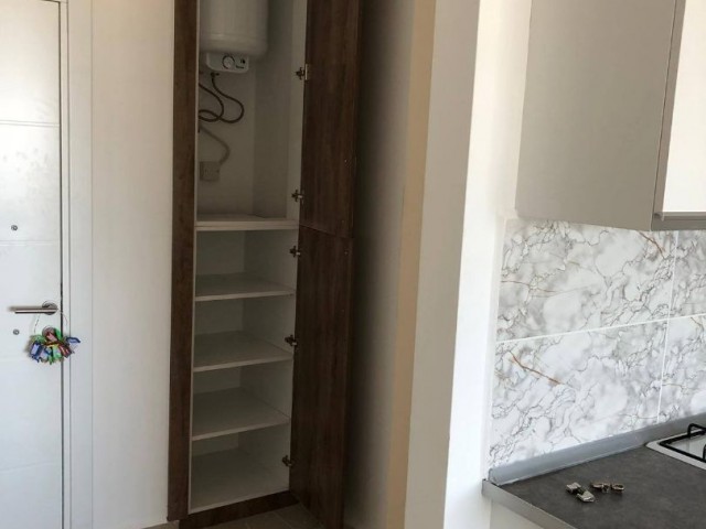 LEFKE DE YATIRIMLIK  EŞYALI  SATILIK YENİ DAİRE