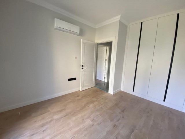 2+1 FLAT FOR SALE IN GIRNE KARAOĞLANOĞLUN SITE WITH POOL