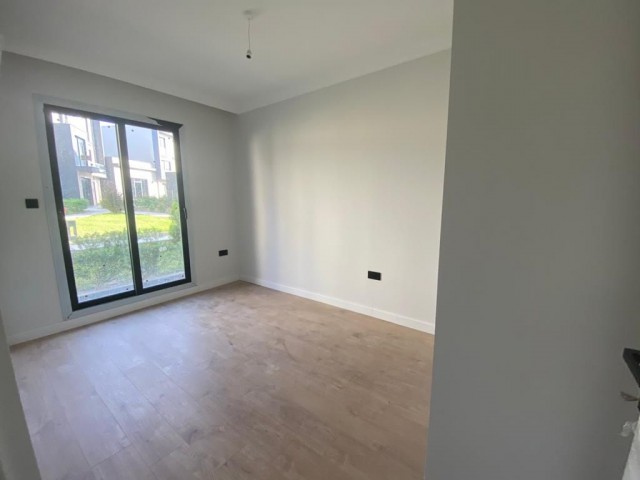 2+1 FLAT FOR SALE IN GIRNE KARAOĞLANOĞLUN SITE WITH POOL