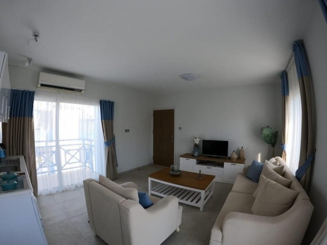 Unfurnished flat for rent in a complex with pool in Alsancak