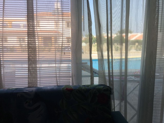 For sale Kyrenia-Alsancak 1+1, fully furnished, air-conditioned, has a terrace, half park, 42 square meters, first floor, in a complex with pool, 8 years building, equivalent to your husband.