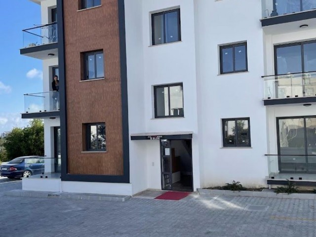 Girne - Alsancak, satılık yeni daire 2+1, Camelot Plajı'nın yanında