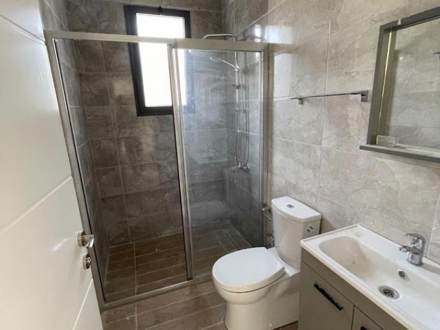 Girne - Alsancak, satılık yeni daire 2+1, Camelot Plajı'nın yanında