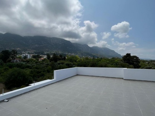 2+1 Flat in the Center of Lapta with Swimming Pool and Ground Parking