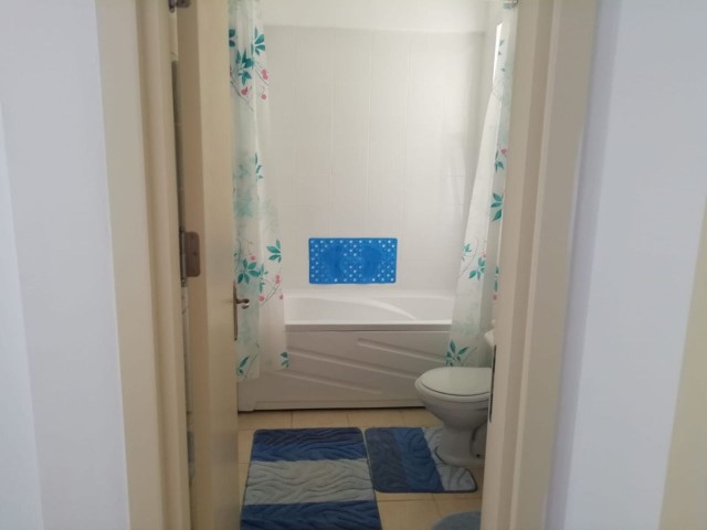 Kyrenia - Esentepe, furnished, 2+1 flat with white goods and private garden. It is 300 meters from the sea. We can speak Turkish, English and Russian.