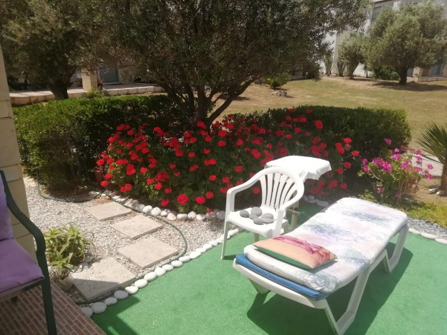 Kyrenia - Esentepe, furnished, 2+1 flat with white goods and private garden. It is 300 meters from the sea. We can speak Turkish, English and Russian.