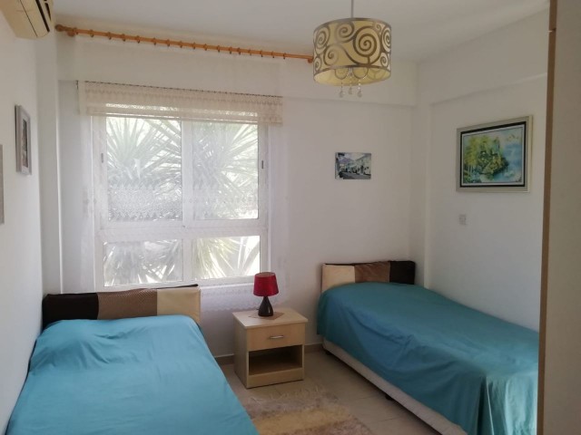 Kyrenia - Esentepe, furnished, 2+1 flat with white goods and private garden. It is 300 meters from the sea. We can speak Turkish, English and Russian.