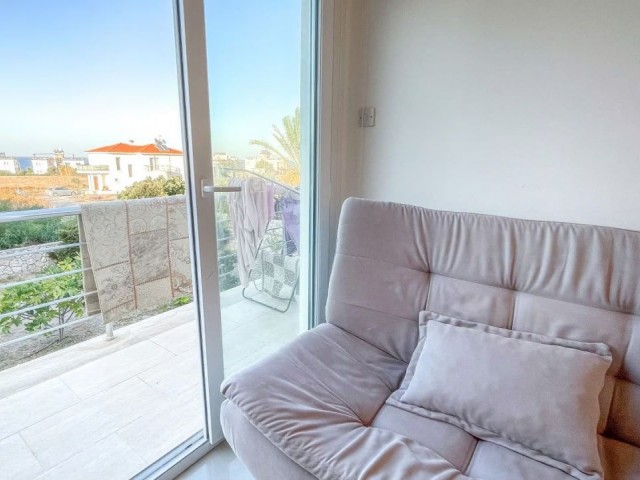 For sale in Girne - Lapta, furnished 1+1 apartment with appliances. 250 meters to the sea.
