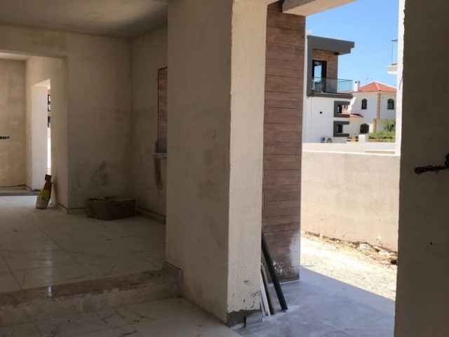 In Iskele - Bahçeler, in a complex with a pool, 700 meters from the sea, twin villas with 3+1 rooms, 178 square meters, are for sale. We can speak Turkish, English and Russian.