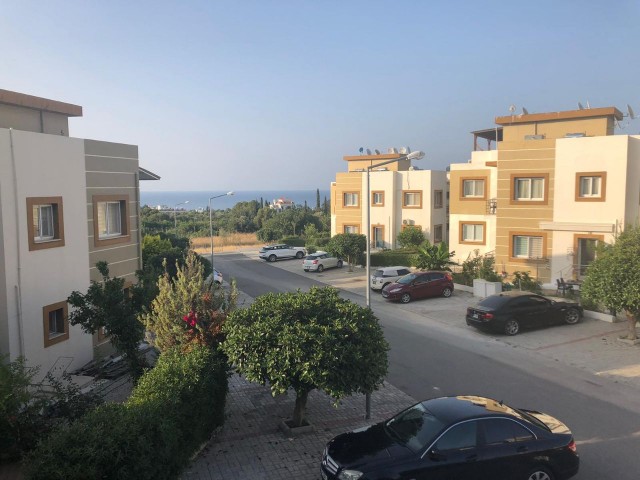 1+1 flat for rent in Kyrenia - Alsancak, in a complex with a large pool and children's playground.